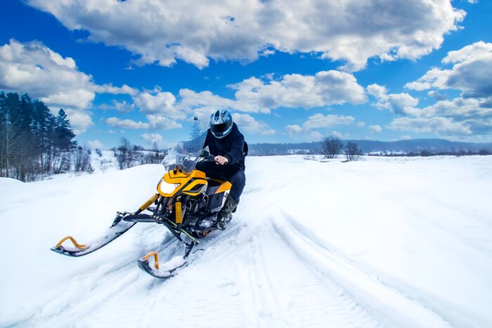 Man,Rides,A,Snowmobile.,Concept,-,Speed.,Concept,-,The